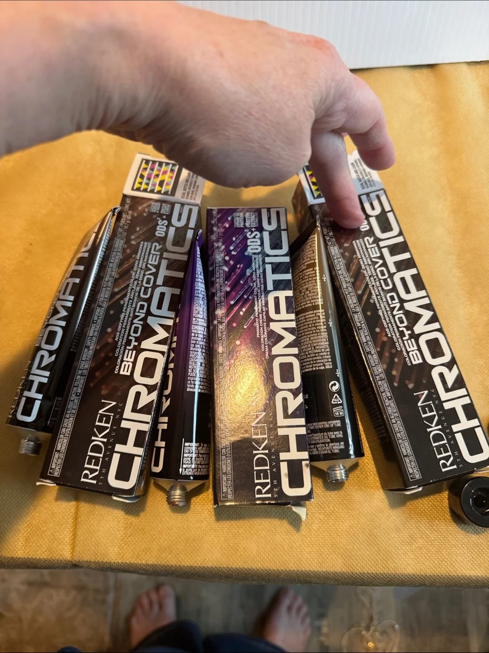Redken Chromatics Hair Color Tubes in Metallic Brown and Deep Purple